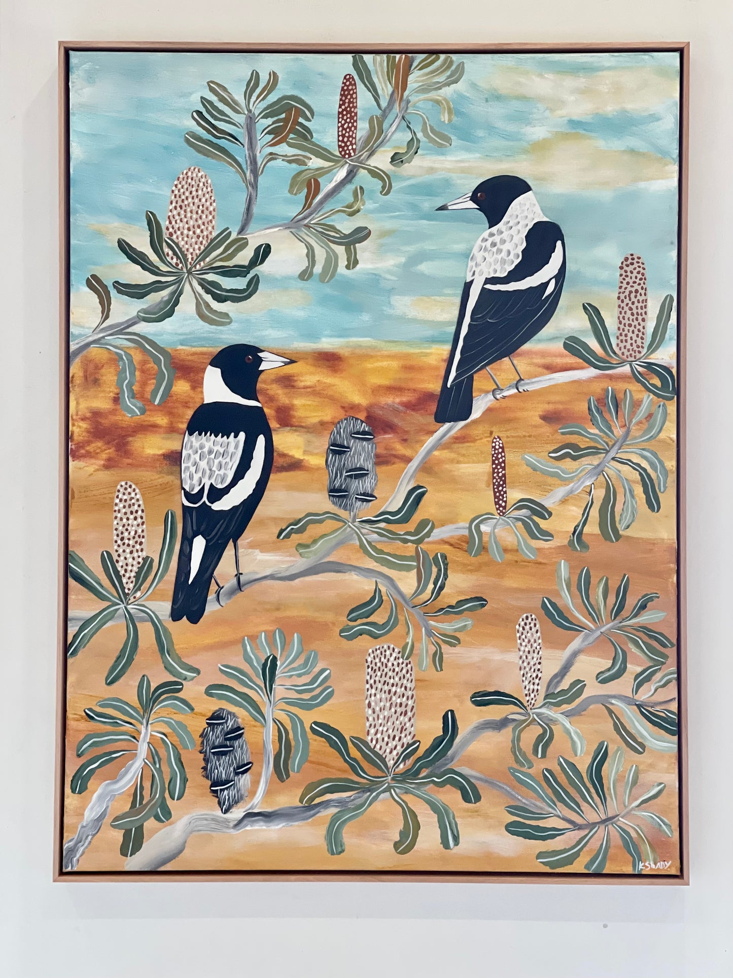 Magpies in the Banksia